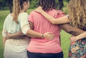 women hugging